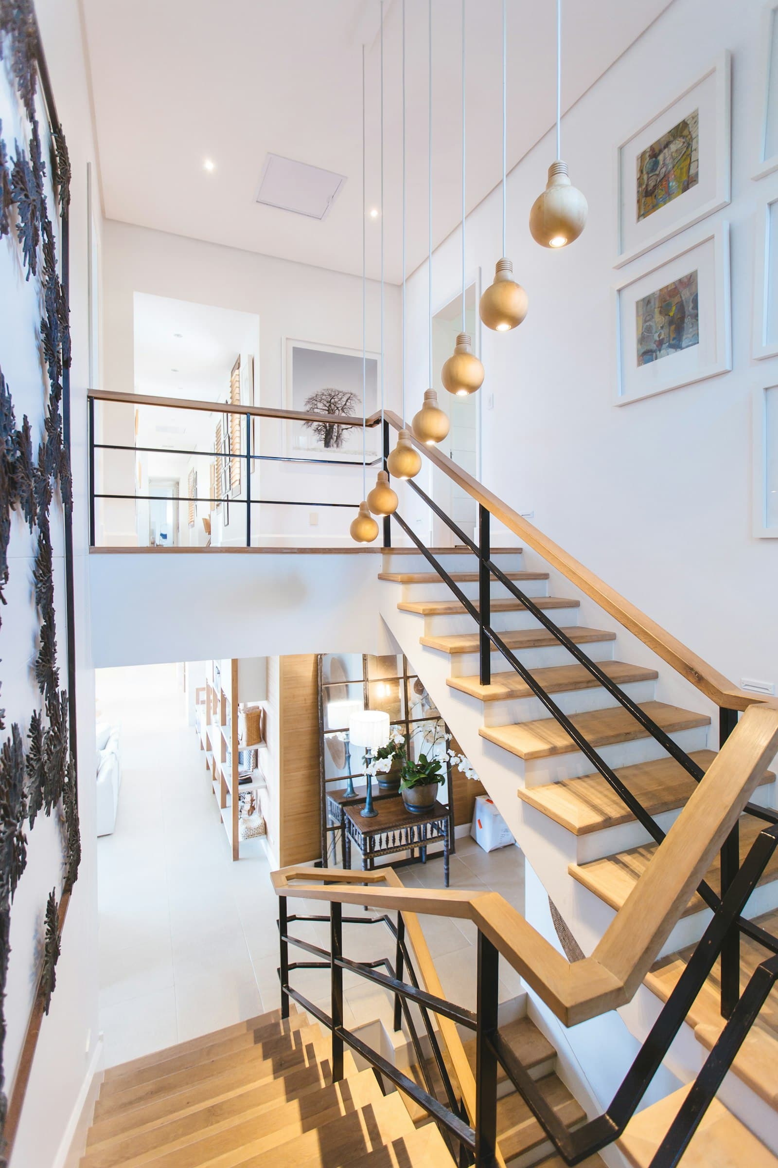 Escalier bois quart tournant avec garde-corps contemporain.